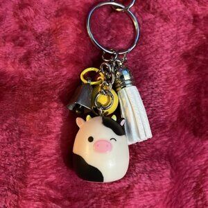 Connor cow squishmallow keychain